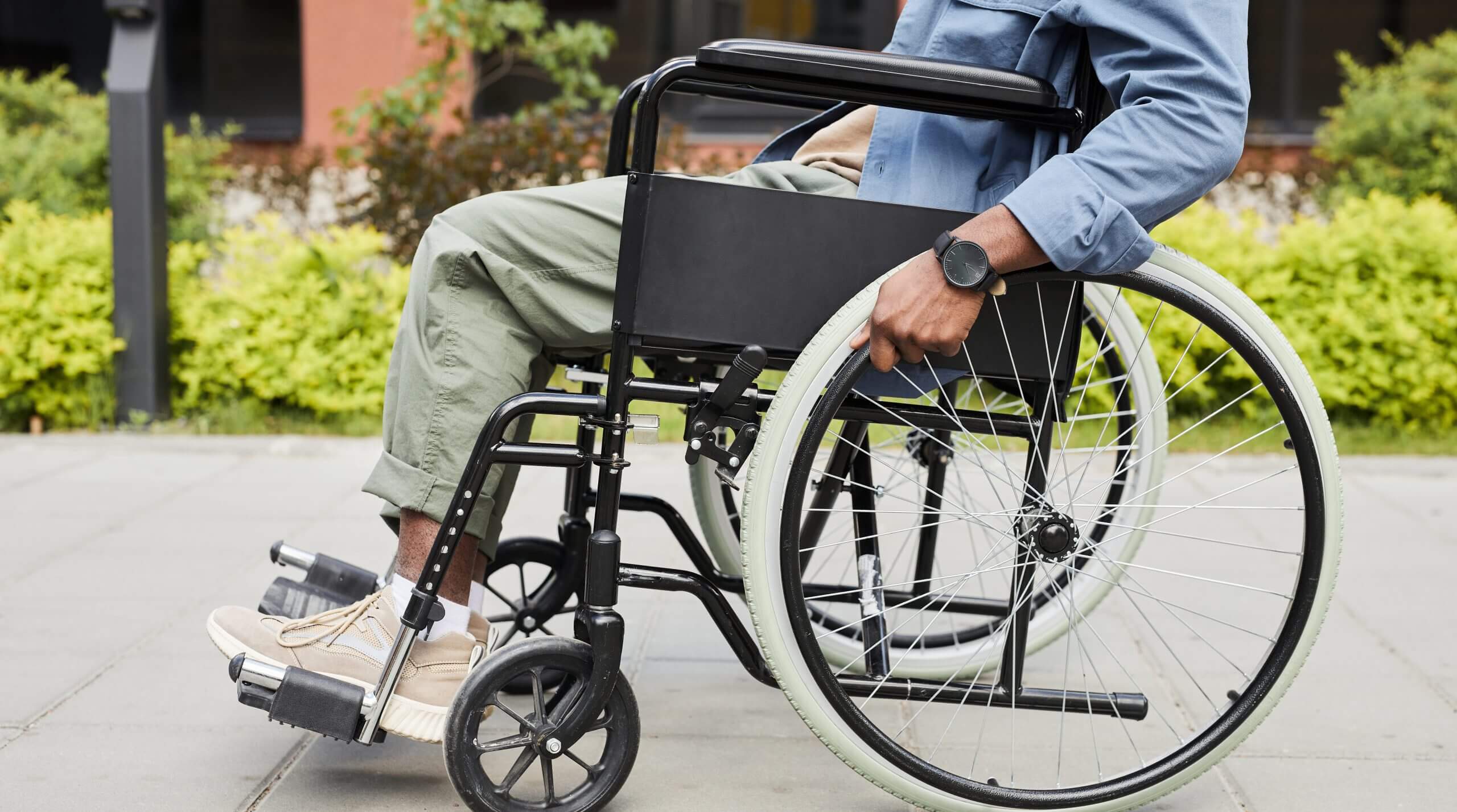 Unrecognizable invalid in wheelchair